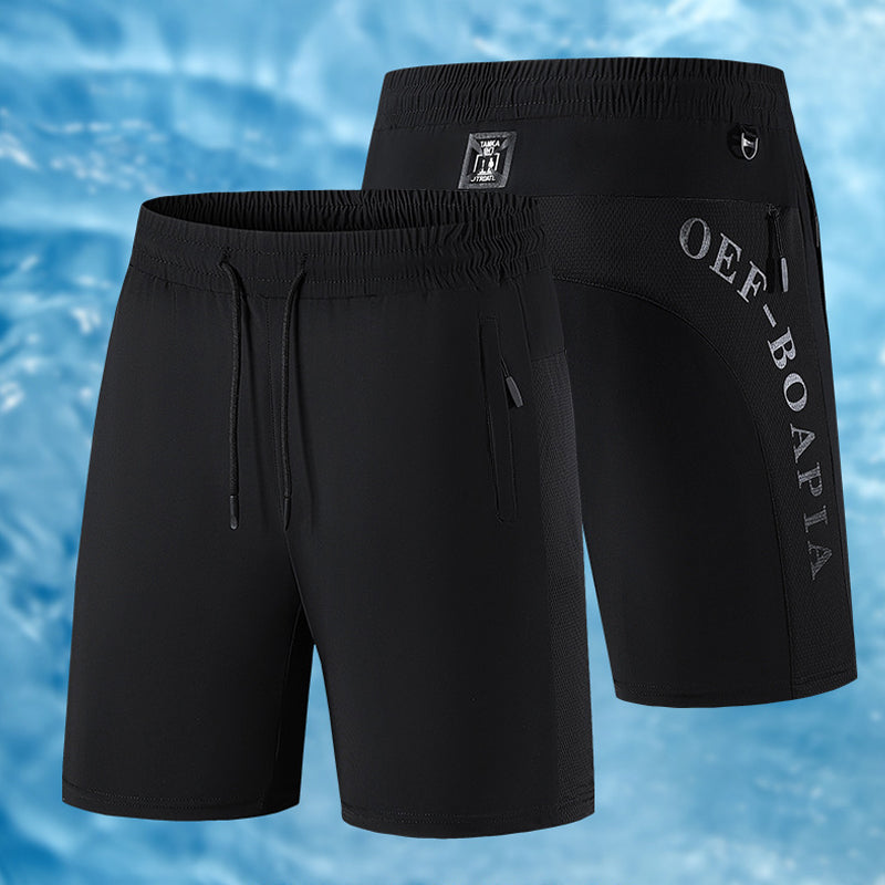 "Ergonomiske sportsshorts, elastisk snørebelte, sommerlig design, lett stoff, ideell for utendørs aktiviteter."
