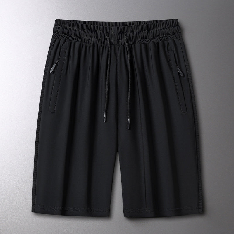 "Ergonomiske sportsshorts, elastisk snørebelte, sommerlig design, lett stoff, ideell for utendørs aktiviteter."