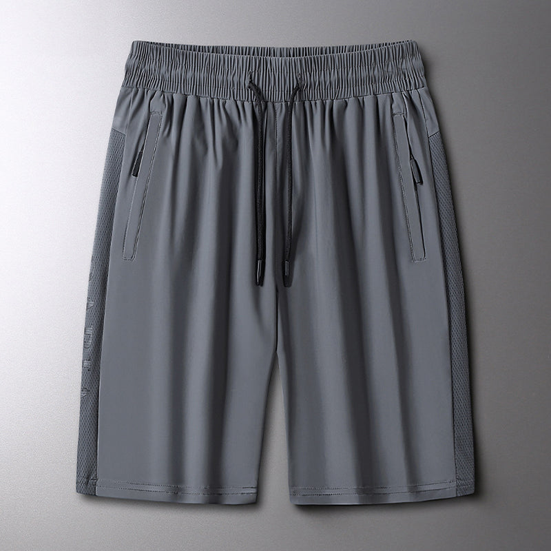 "Ergonomiske sportsshorts, elastisk snørebelte, sommerlig design, lett stoff, ideell for utendørs aktiviteter."
