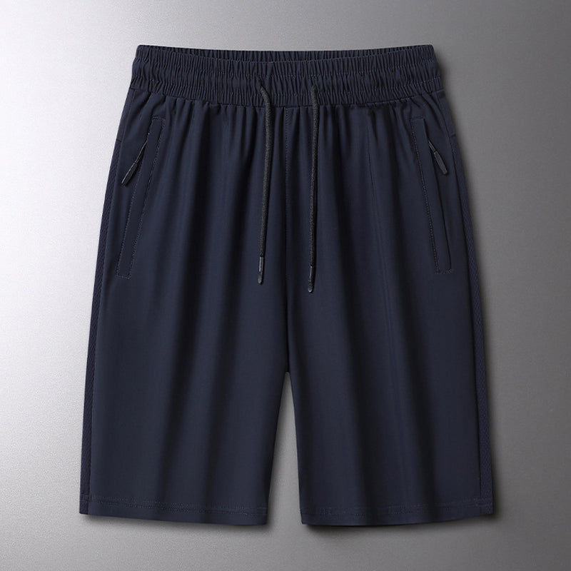 "Ergonomiske sportsshorts, elastisk snørebelte, sommerlig design, lett stoff, ideell for utendørs aktiviteter."