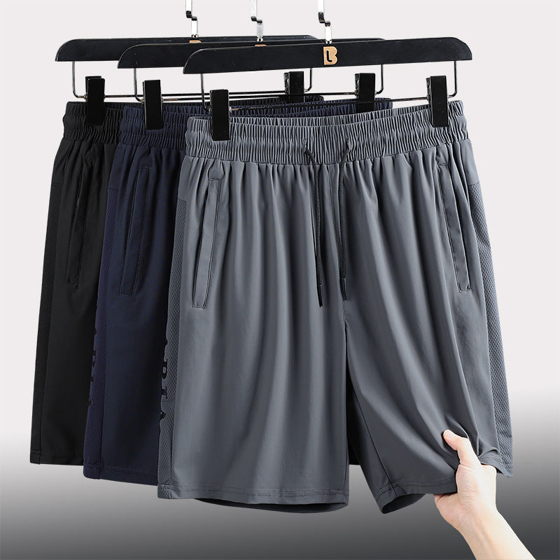 "Ergonomiske sportsshorts, elastisk snørebelte, sommerlig design, lett stoff, ideell for utendørs aktiviteter."