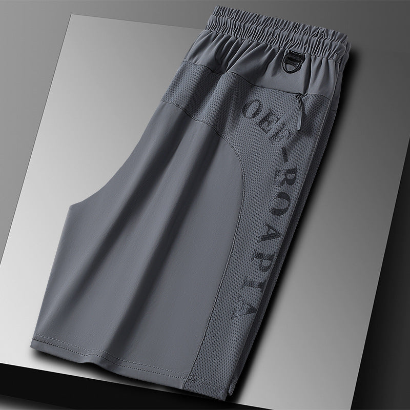 "Ergonomiske sportsshorts, elastisk snørebelte, sommerlig design, lett stoff, ideell for utendørs aktiviteter."