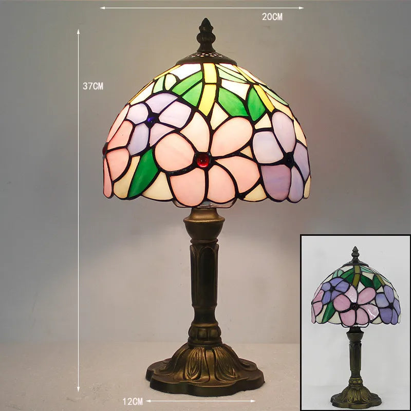 Bordlampe med klart LED-lys og fargerik, fleksibel design, ideell som leselampe eller dekorlampe.