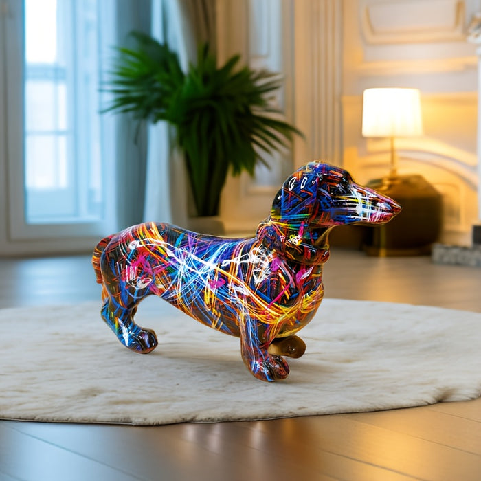 Fargerik dachshundfigur i lekende positur. En moderne dyrefigur og prydfigur som passer i ethvert hjem.