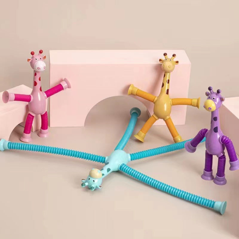 "Fargerikt teleskopisk giraffleketøy med sugekopp. Livlige farger som rosa, blå, lilla og gul, formbar og morsom for barn."