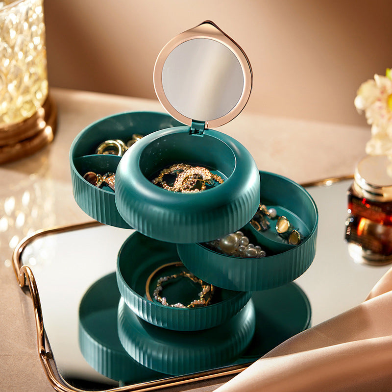 "Flerlags smykkeskrin med 360 graders roterende design, i elegant hvit, for trygg og organisert smykkeoppbevaring."