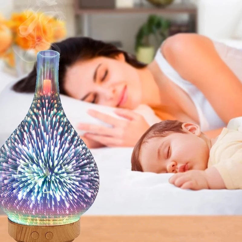 Elektronisk aromaterapi diffuser i design av fyrverkeri med 3D-glass, fukter luft og sprer duft.