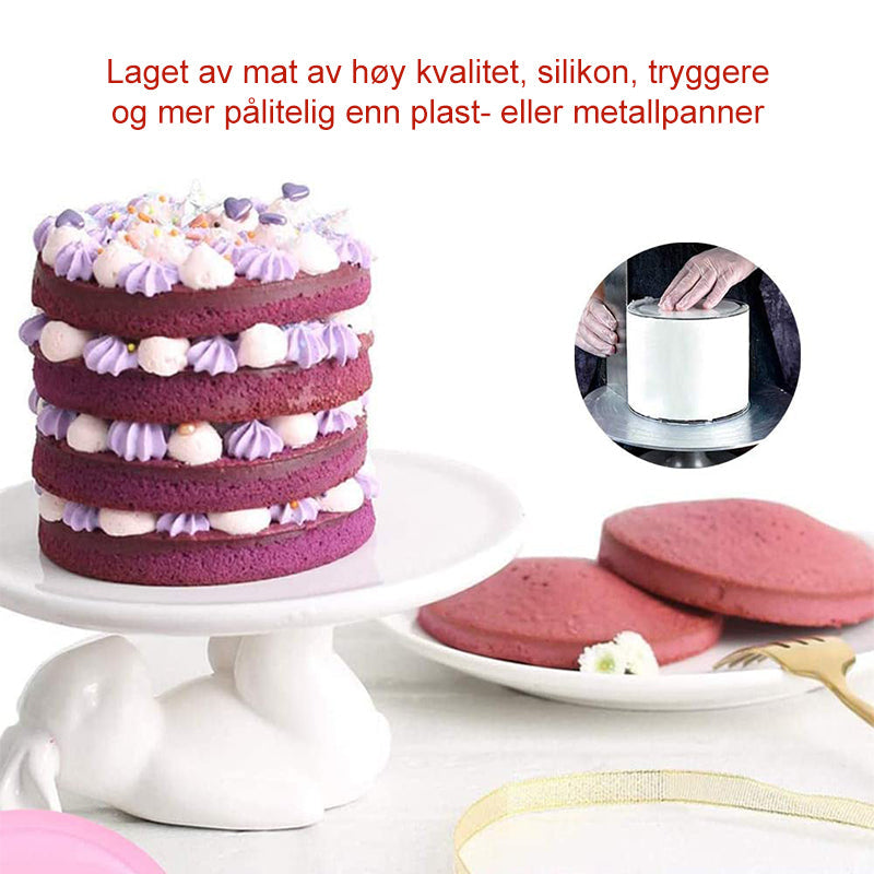Gjenbrukbar lagdelt kakeform i rosa silikon, perfekt for å lage regnbuekaker, gir jevne lag uten oppskjæring.