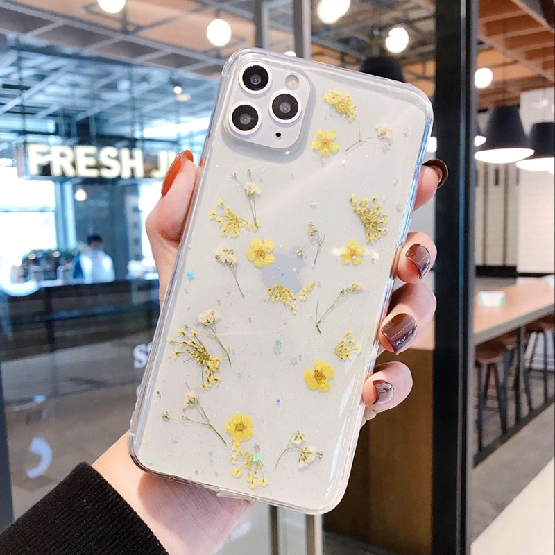 Innovativt gjennomsiktig iPhone-deksel med blomstermotiv for optimal beskyttelse og stil.