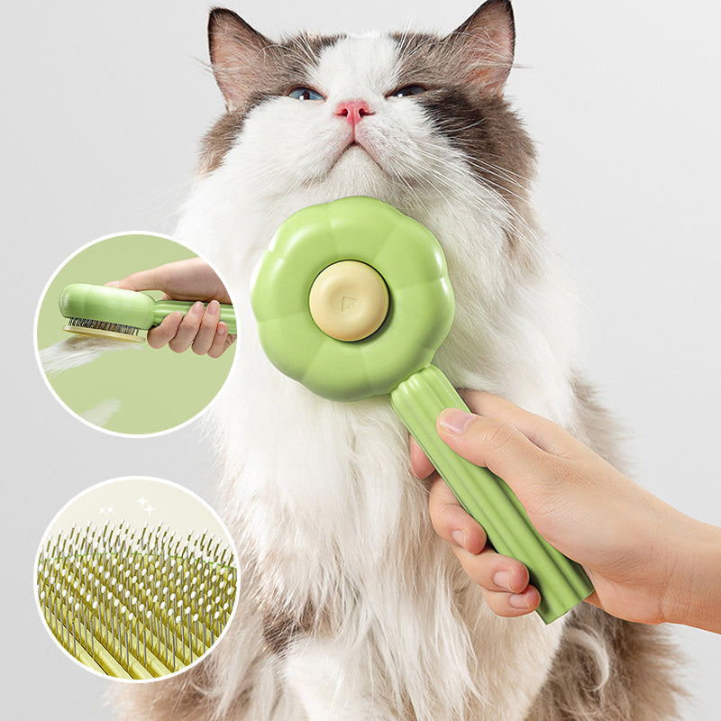 "Grønn selvrensende kjæledyrbørste med ergonomisk håndtak for effektiv pleie av hund og katt"