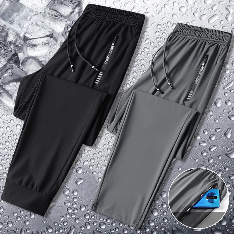 Sporty herre fritidsbukse med glidelåslommer, ideell for trening, hverdagsbruk og avslappede dager.