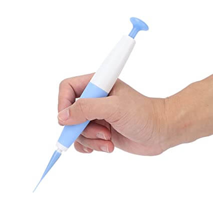 Bilde av hudtaggfjerner kit med applikator og ringer for enkel fjerning