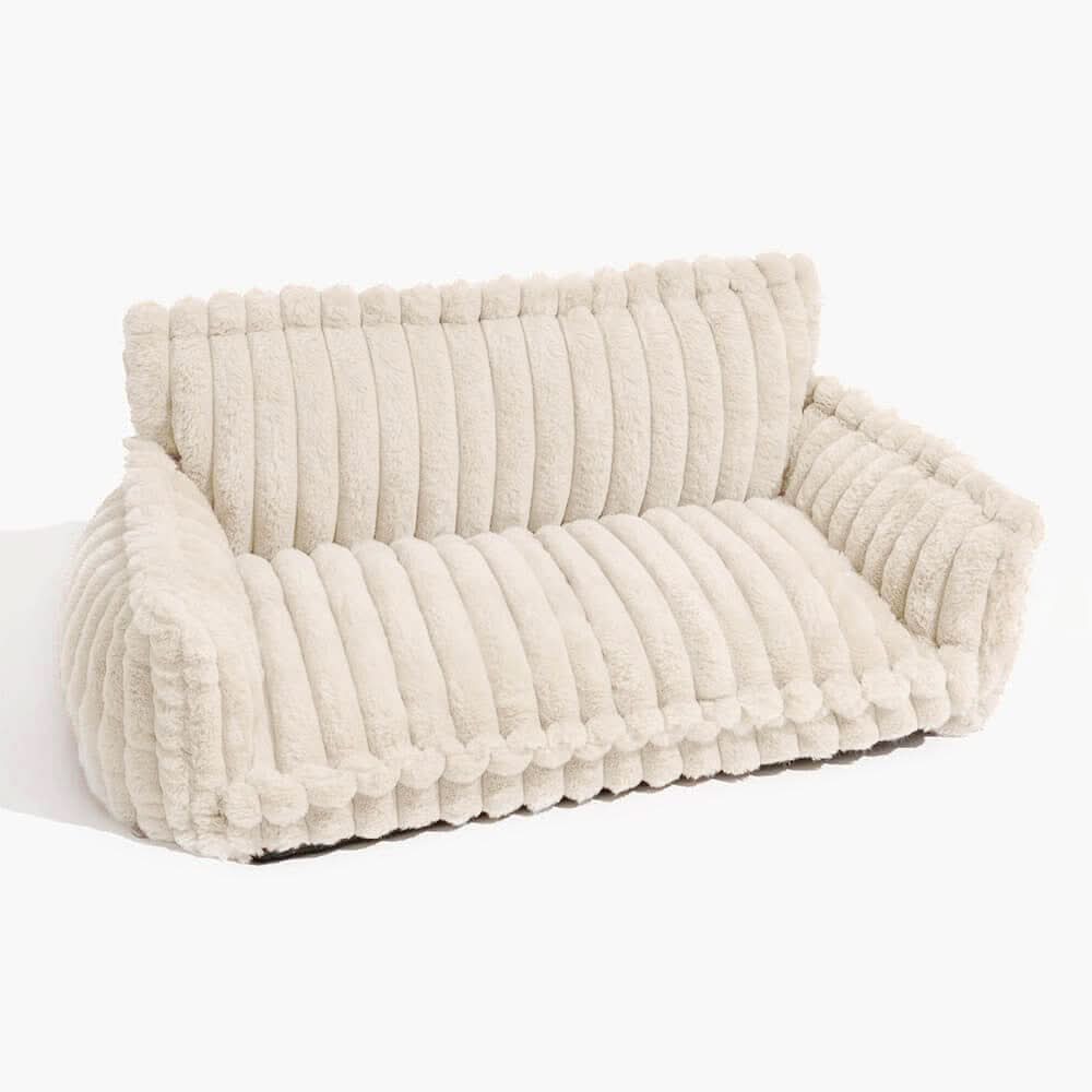 Detalj av myk hundesofa med hevet kant. Ergonomisk design for optimal komfort og støtte til kjæledyr.