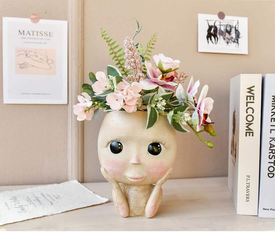 Detalj av ansiktsblomsterpotte, resin materiale, hvit farge