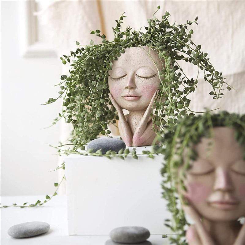 Gaveidé: Dekorativ ansiktsblomsterpotte i resin, bordpynt