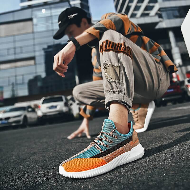 Herre sneakers i et rent design, kombinerer pusteevne og lettvekt for topp komfort.