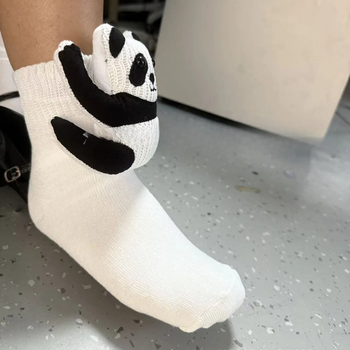 Nærbilde av fluffy hussokker. Viser myk tekstur og sjarmerende 3D dyremotiv.