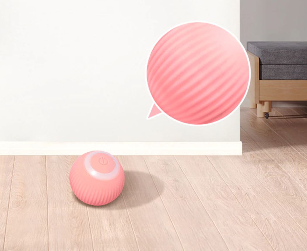 Valp som jager interaktiv rullende ball; en morsom og smart USB-oppladbar leke for fysisk aktivitet.