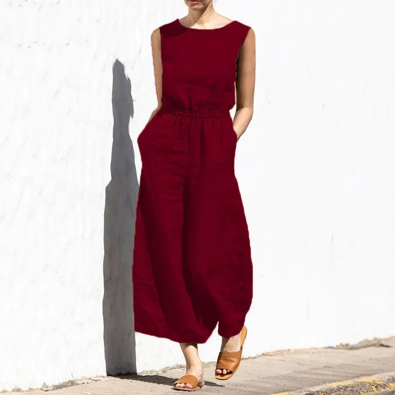 Jumpsuit for kvinner med høy midje og vid passform, en elegant og komfortabel heldress for sommeren.