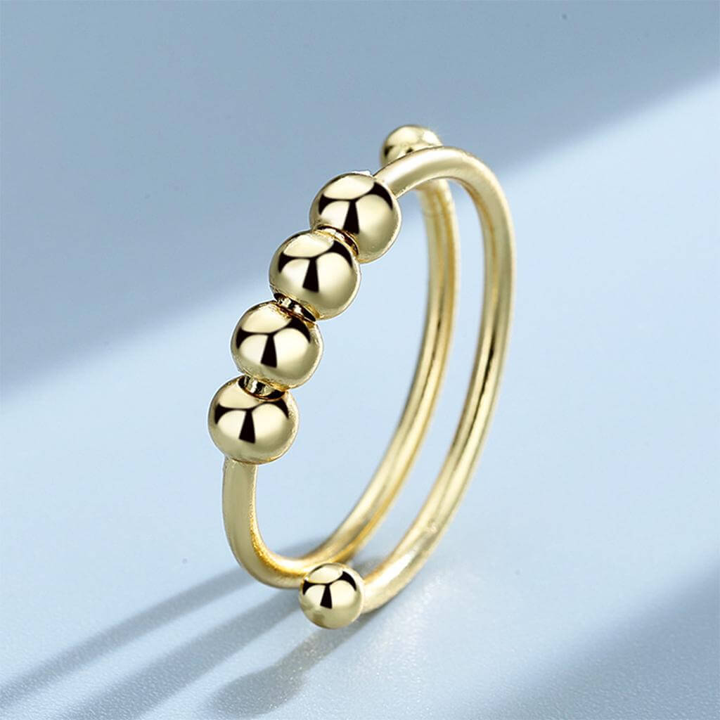 Elegant fidget-ring i sølv for kvinner, designet for stressmestring og fokus, beroligende smykke
