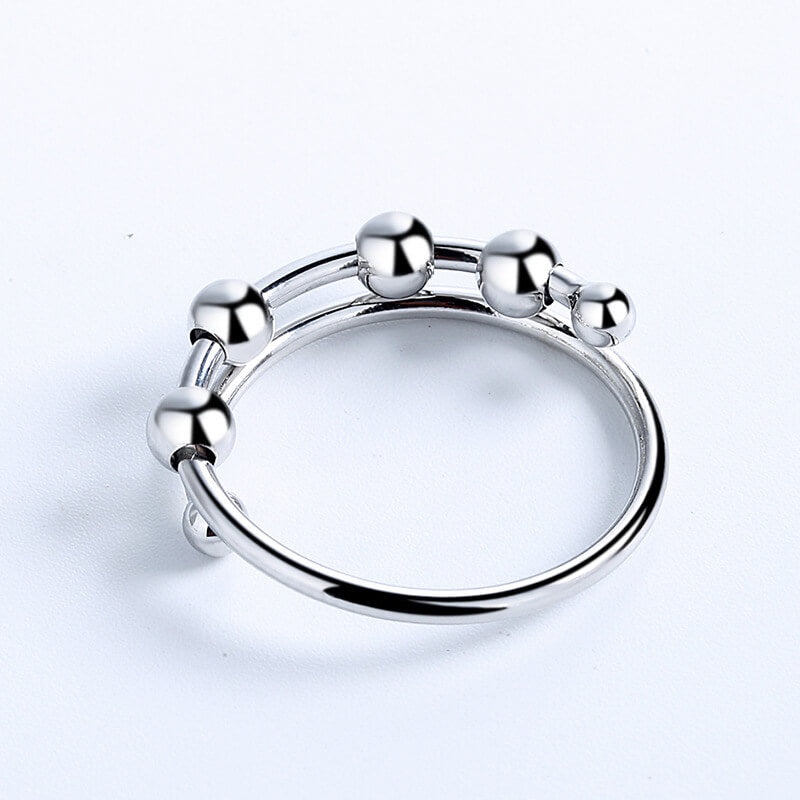Moderne kvinners fidget-ring for angstlindring, justerbar og stilig smykke i sølvdesign