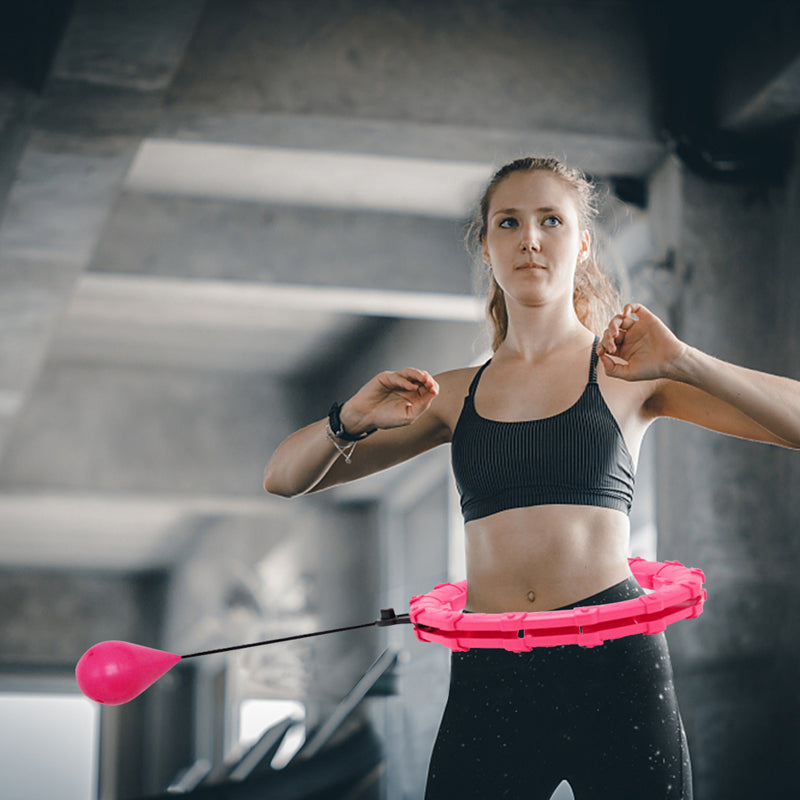"Justerbar lilla vektet hula hoop for effektiv fettforbrenning og komfortabel massasje under trening."