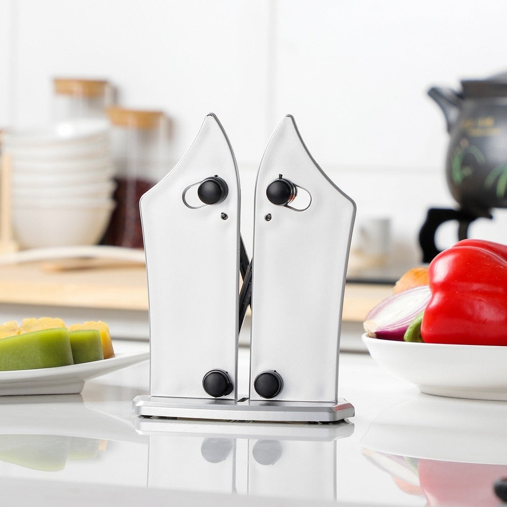 Knivsliper med fjærbare stenger for alle knivtyper. Enkel i bruk. Kompakt design, perfekt for kjøkkenbruk.