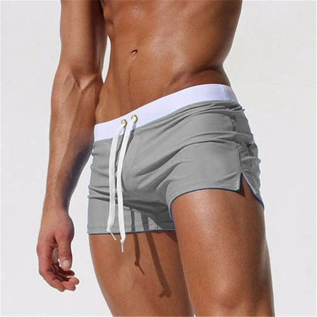 Menns mønstrede badeshorts, komfortable og trendy for strand og sommer, hurtigtørkende stoff.