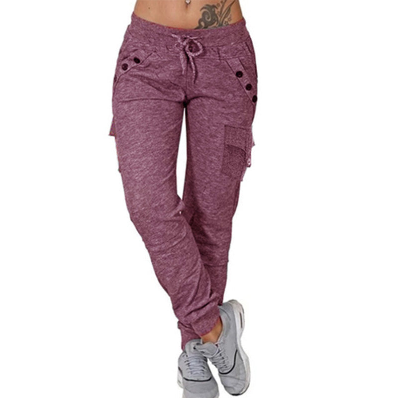 Komfortable joggebukser med snøring, lommer og elastisk midje for kvinner. Perfekt for trening og avslapning i moderne stil.