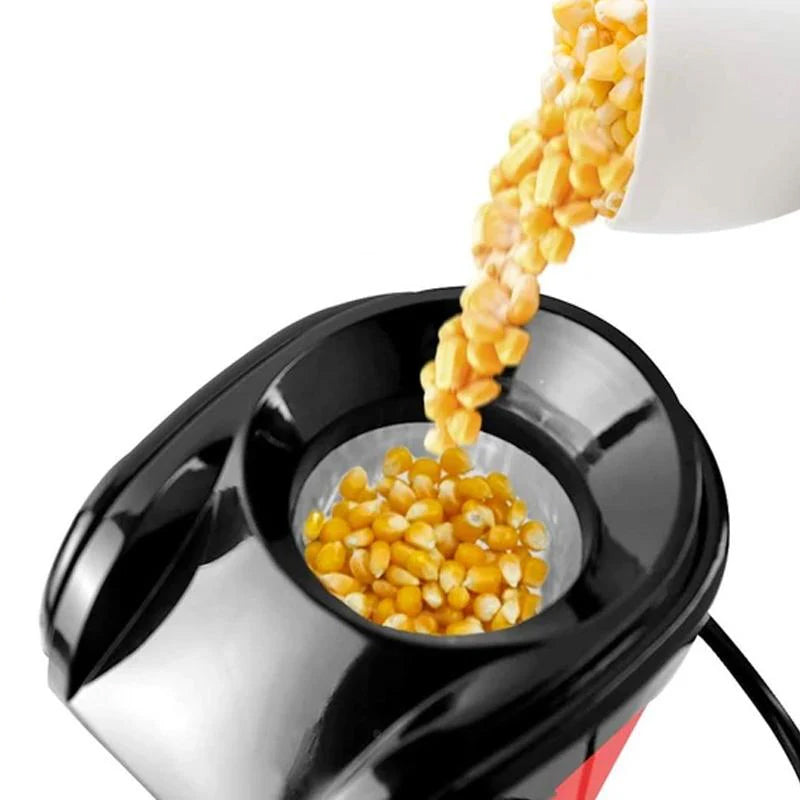 "Kompakt elektrisk popcornmaskin i rustfritt stål, stilren design. Ideell for rask hjemmebruk, enkel å betjene."