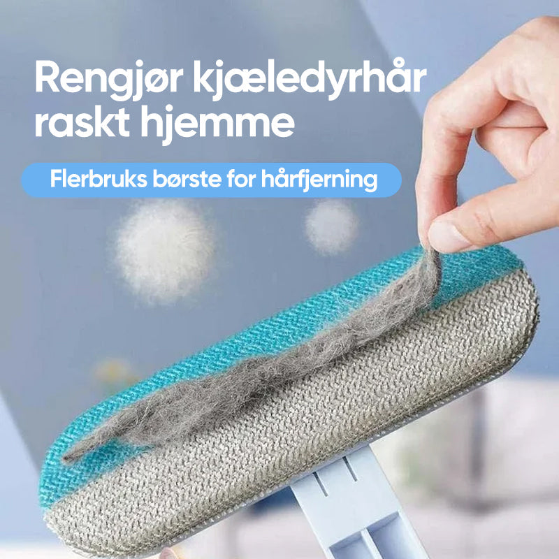 "Kompakt lyseblå kjæledyrhårfjerner på mørkt teppe, effektiv løsning for fjerning av kjæledyrhår fra møbler og tekstiler."