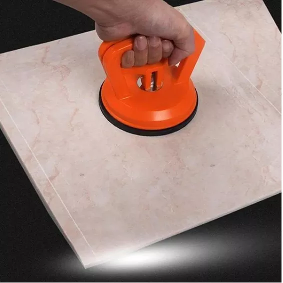 Kraftig blå sugkoppløfter for enkel bil bulkreparasjon med ergonomisk håndtak og gummi for solid grep.