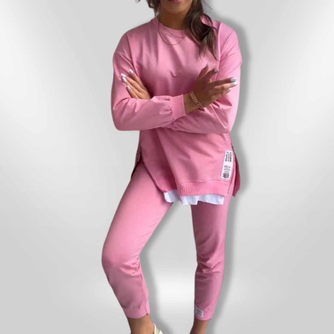 Trendy oransje oversized loungewear sett for kvinner. Avslappet sweatshirt og komfortable joggers.
