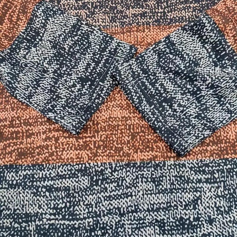 Feminine langermet bluse med elegant halvlås, ideell for hverdagsmote og komfort.
