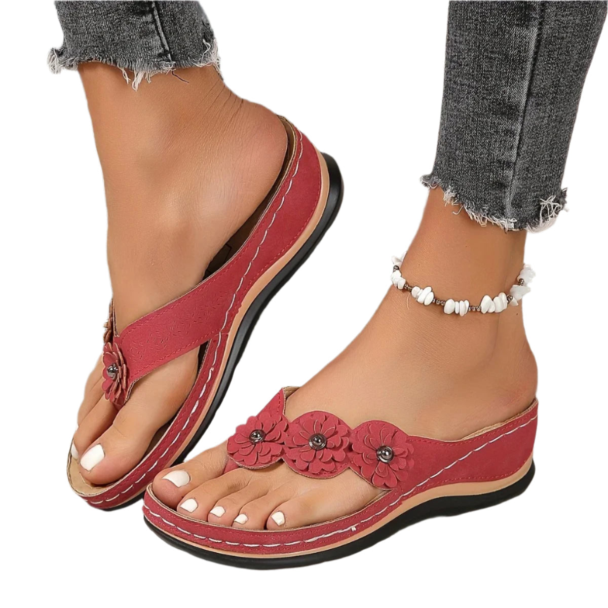 Komfortable lette slip-on sandaler med blomster, feminine og perfekte for varme dager.