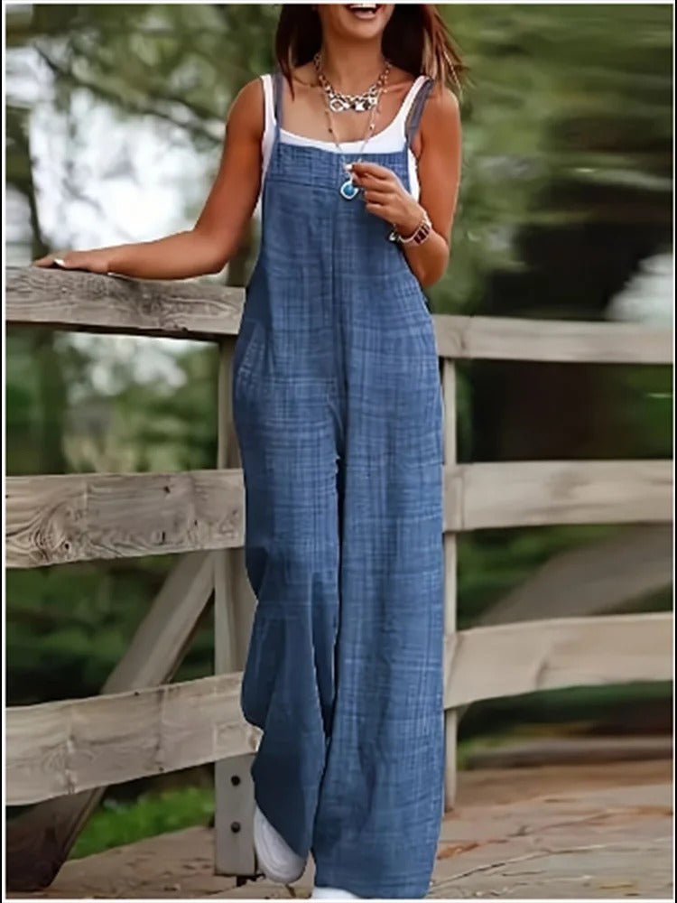 Elegant ermeløs jumpsuit med vide ben for kvinner, trendy sommerstil.