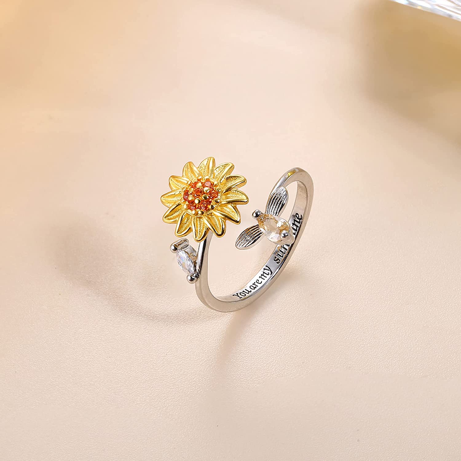 Kvinners solsikke fidget ring i sølv for angstlindring, med spinnende solsikkedesign