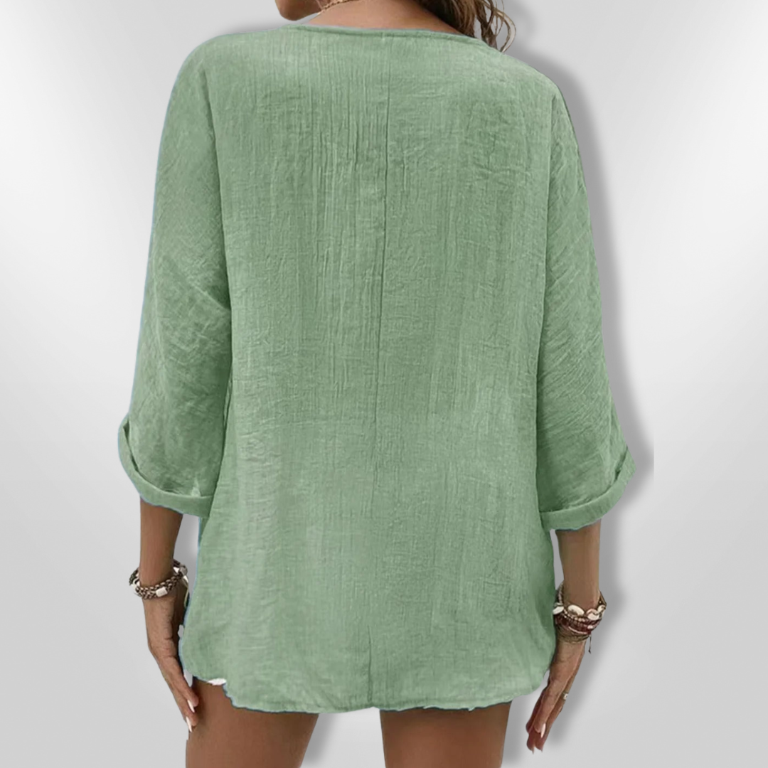 Allsidig kvinnetopp med V-hals og knapper; et must for elegant hverdagsstil og sommer.