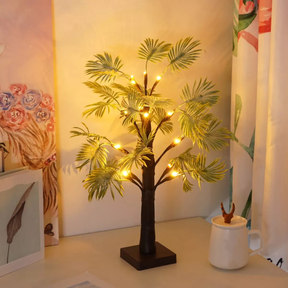 "LED-julelys med palmebladdesign, elegant og festlig dekorasjon for hjemmet, gir varm belysning og tropisk preg."