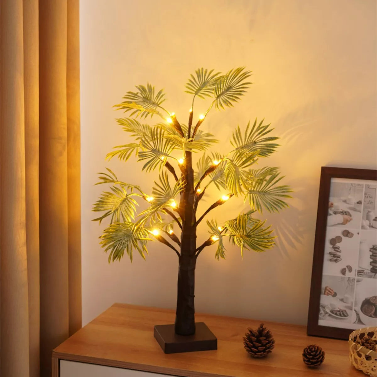 "LED-julelys med palmebladdesign, elegant og festlig dekorasjon for hjemmet, gir varm belysning og tropisk preg."