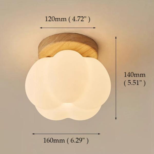 "Leken gresskarformet taklampe i tresort, perfekt for å skape et varmt, sjarmerende miljø i hjemmet ditt."