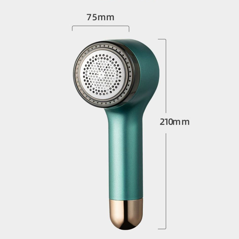 "Liten oppladbar lofjerner i grønt for skånsom stoffpleie, vises med USB-port for enkel lading og kompakt design."