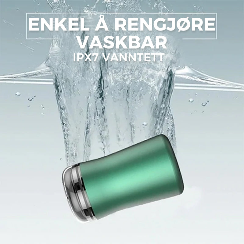 "Lommestørrelse, vanntett elektrisk barberhøvel i stilrent grønt og svart design, perfekt for reise og daglig bruk."