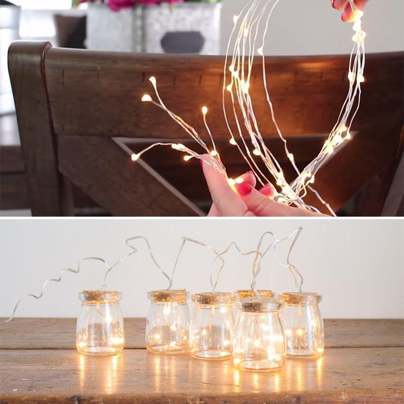 "Magiske LED Ildflue Bunt Lys i varm hvit, fleksibel design, ideell for utendørs dekorasjon og hagebelysning."