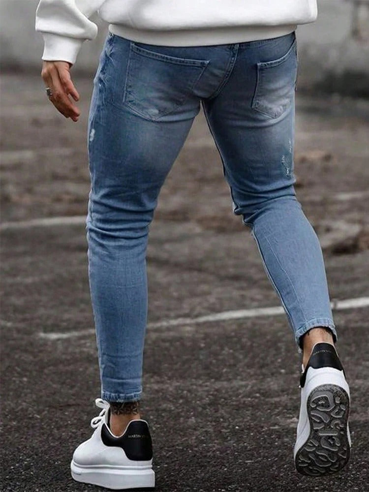 Komfortable menns rippede skinny jeans, et must for avslappet og moderne street style.