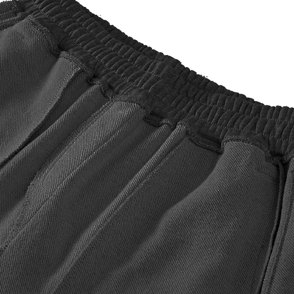 Svarte, atletiske joggebukser for menn, tilbyr overlegen komfort og stil for all type trening.