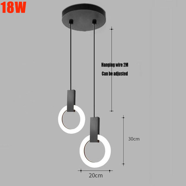 "Minimalistisk LED-pendellampe i sirkulær design, gir varm belysning med nordisk eleganse, ideell for moderne rom."