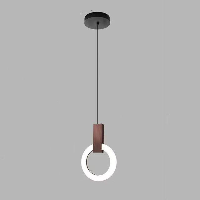 "Minimalistisk LED-pendellampe i sirkulær design, gir varm belysning med nordisk eleganse, ideell for moderne rom."