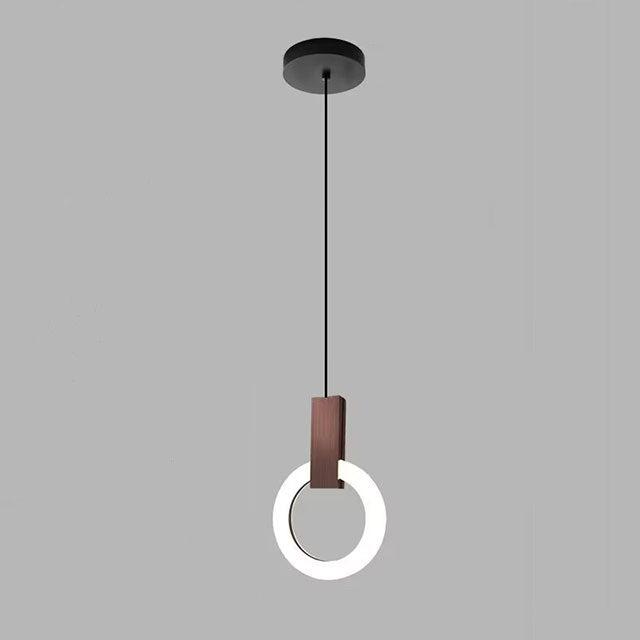 "Minimalistisk LED-pendellampe i sirkulær design, gir varm belysning med nordisk eleganse, ideell for moderne rom."