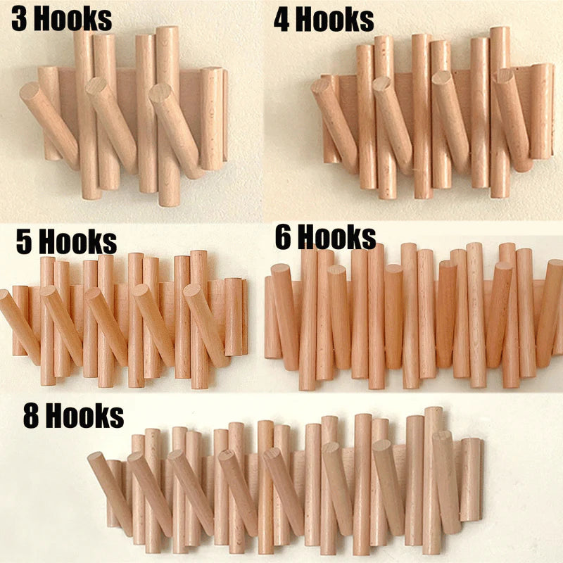 Lyst tre veggklesstativ med minimalistisk uttrykk, ideelt for moderne hjemmets entre.